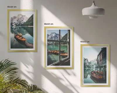 Three-piece mountain lake boats wall art featuring a landscape with a house