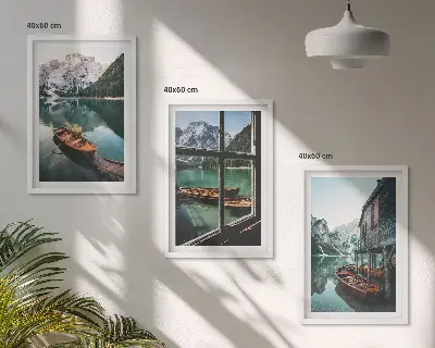 Three-piece mountain lake boats wall art featuring a landscape with a house