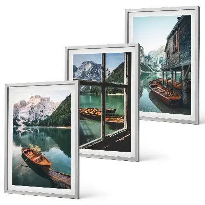 Three-piece mountain lake boats wall art featuring a landscape with a house
