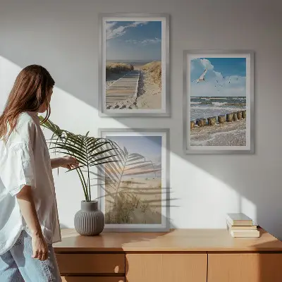 Wall art set featuring a coastal beach scene with sand, waves, sky, and birds