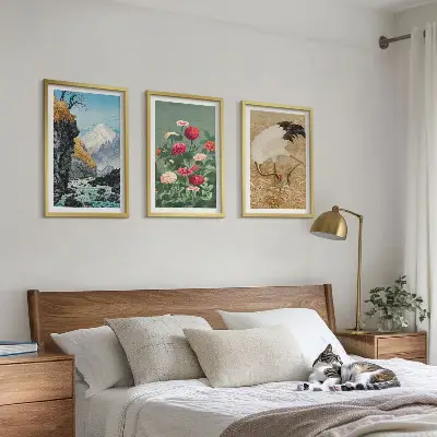 Set of 3 framed wall art pieces featuring a mountain landscape with a river, flowers, and cranes