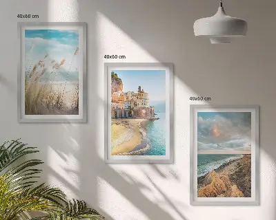 Set of 3 framed wall art pieces featuring beach cliffs and cityscapes