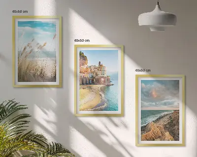 Set of 3 framed wall art pieces featuring beach cliffs and cityscapes