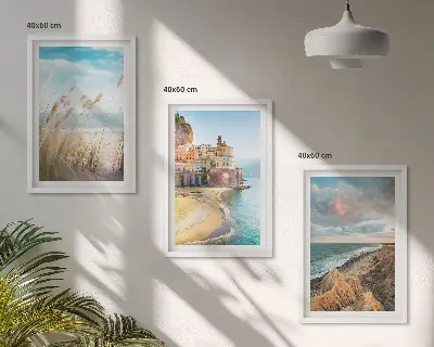 Set of 3 framed wall art pieces featuring beach cliffs and cityscapes