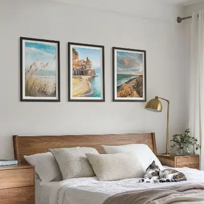 Set of 3 framed wall art pieces featuring beach cliffs and cityscapes
