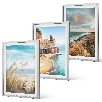 Set of 3 framed wall art pieces featuring beach cliffs and cityscapes