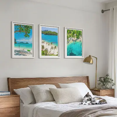 Set of 3 framed wall art pieces featuring beaches, palm trees, and clear water