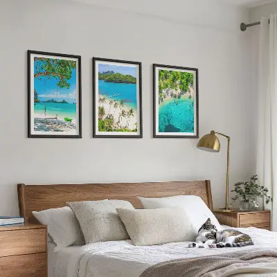 Set of 3 framed wall art pieces featuring beaches, palm trees, and clear water