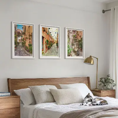 Set of 3 framed wall art pieces featuring streets, flowers, and an Italian atmosphere