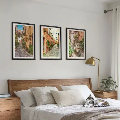 Set of 3 framed wall art pieces featuring streets, flowers, and an Italian atmosphere