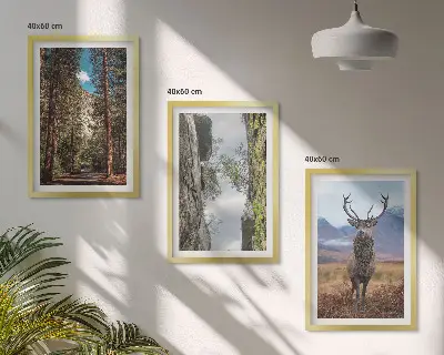 Set of 3 framed wall art pieces featuring a road through a forest with mountains and deer