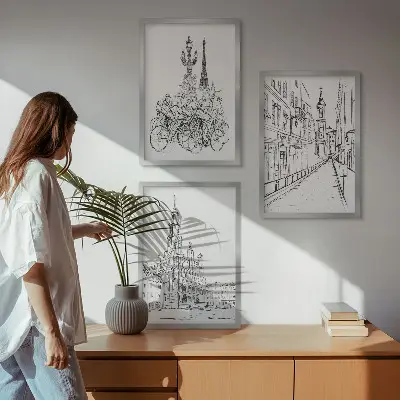 Set of 3 framed wall art pieces featuring simple urban landscape drawings