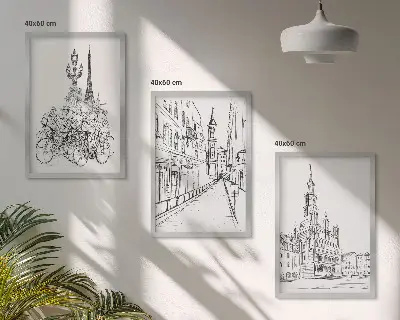Set of 3 framed wall art pieces featuring simple urban landscape drawings