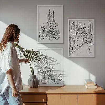 Set of 3 framed wall art pieces featuring simple urban landscape drawings