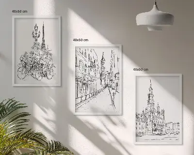Set of 3 framed wall art pieces featuring simple urban landscape drawings