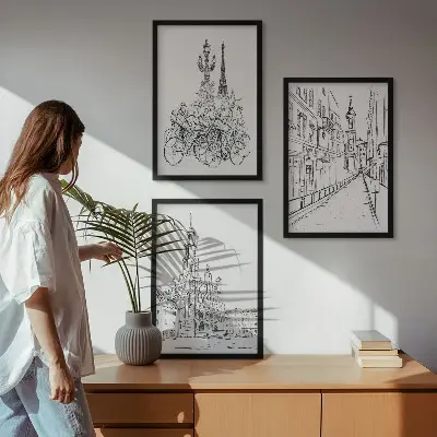 Set of 3 framed wall art pieces featuring simple urban landscape drawings