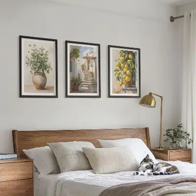 Set of 3 framed wall art pieces featuring plants in pots, lemons, and a street scene
