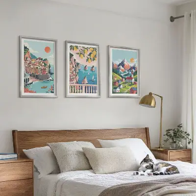 Set of 3 framed wall art pieces colorful mountains and cities design