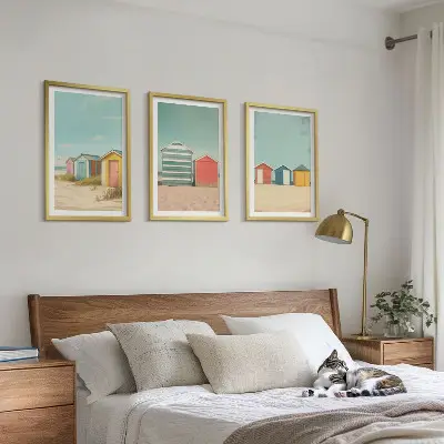 Three-piece wall art set colorful houses beach and sun scene
