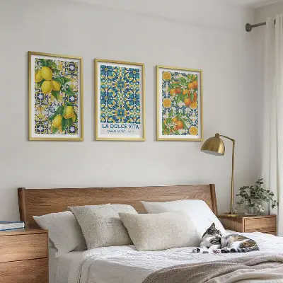 Set of 3 framed wall art prints featuring lemons, oranges, and flowers in an Italian style