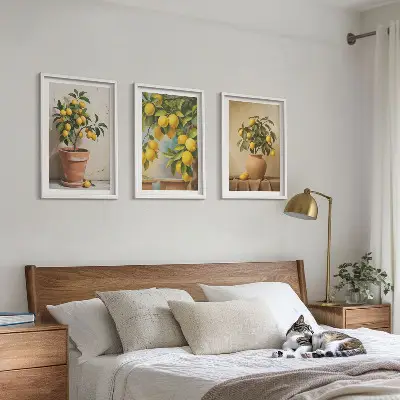 Set of 3 framed wall art pieces featuring lemon trees in a pot and a vase