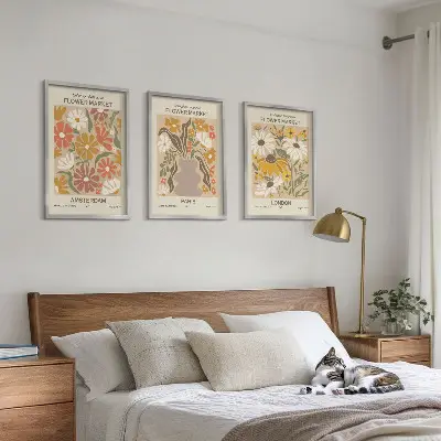 Set of 3 framed wall art pieces featuring floral patterns of Amsterdam, Paris, and London