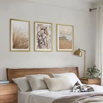 Wall art set featuring beach motifs with shells and waves