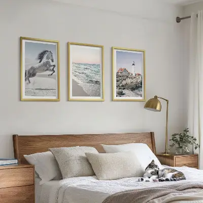 Wall art set featuring horses, a beach, a lighthouse, and ocean waves