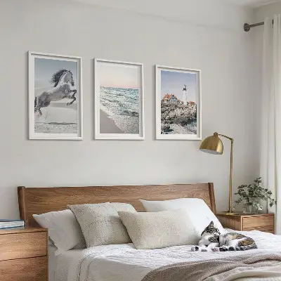 Wall art set featuring horses, a beach, a lighthouse, and ocean waves