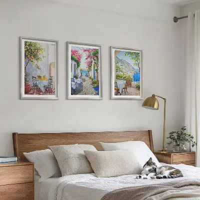 Three-piece wall art set charming streets plants and sea view
