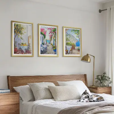 Three-piece wall art set charming streets plants and sea view