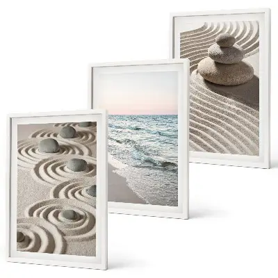 Set of 3 framed wall art pieces featuring waves, sand, water, and beach stones