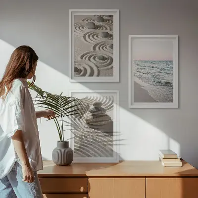 Set of 3 framed wall art pieces featuring waves, sand, water, and beach stones