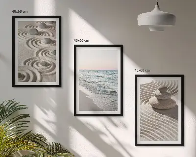 Set of 3 framed wall art pieces featuring waves, sand, water, and beach stones
