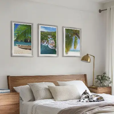 Three-piece wall art set featuring beach, boat, waterfall, and palm tree scenery