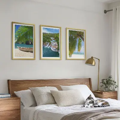 Three-piece wall art set featuring beach, boat, waterfall, and palm tree scenery