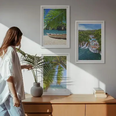 Three-piece wall art set featuring beach, boat, waterfall, and palm tree scenery
