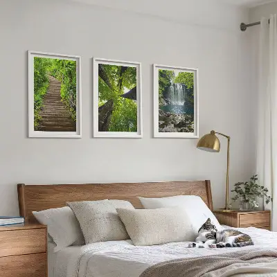 Set of 3 framed wall art pieces featuring a forest path with a waterfall and lush vegetation