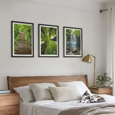 Set of 3 framed wall art pieces featuring a forest path with a waterfall and lush vegetation