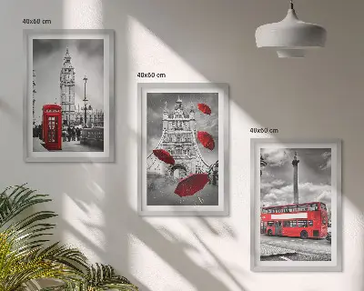 Set of 3 framed wall art pieces featuring a red umbrella booth and a London bus