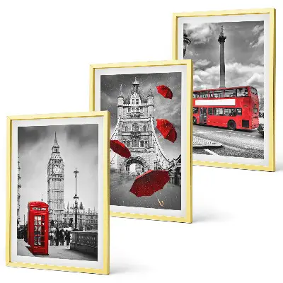Set of 3 framed wall art pieces featuring a red umbrella booth and a London bus