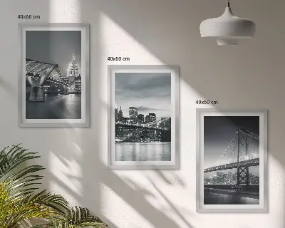 Wall art set featuring bridges and city architecture in gray