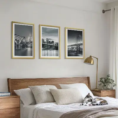 Wall art set featuring bridges and city architecture in gray