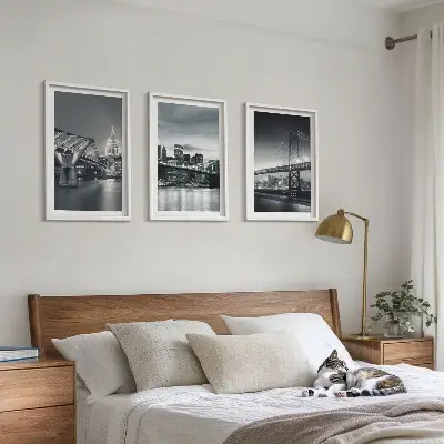 Wall art set featuring bridges and city architecture in gray