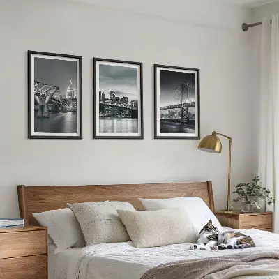 Wall art set featuring bridges and city architecture in gray