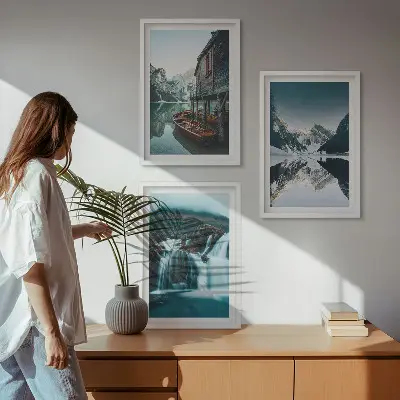 Set of 3 framed wall art pieces featuring mountain landscapes with waterfalls and lakes