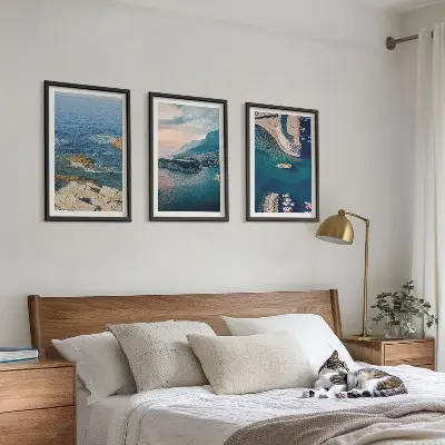 Set of 3 framed wall art pieces featuring sea views, cliffs, and ports