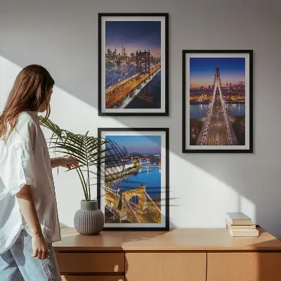Three-piece wall art cities at night featuring bridges and rivers