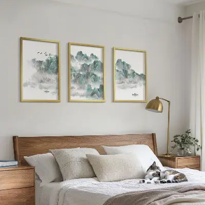 Three-piece wall art set featuring mountains, clouds, birds, and a boat in a Japandi style