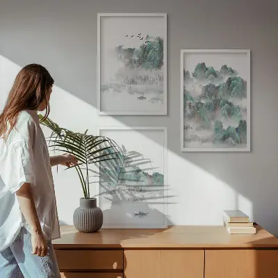 Three-piece wall art set featuring mountains, clouds, birds, and a boat in a Japandi style